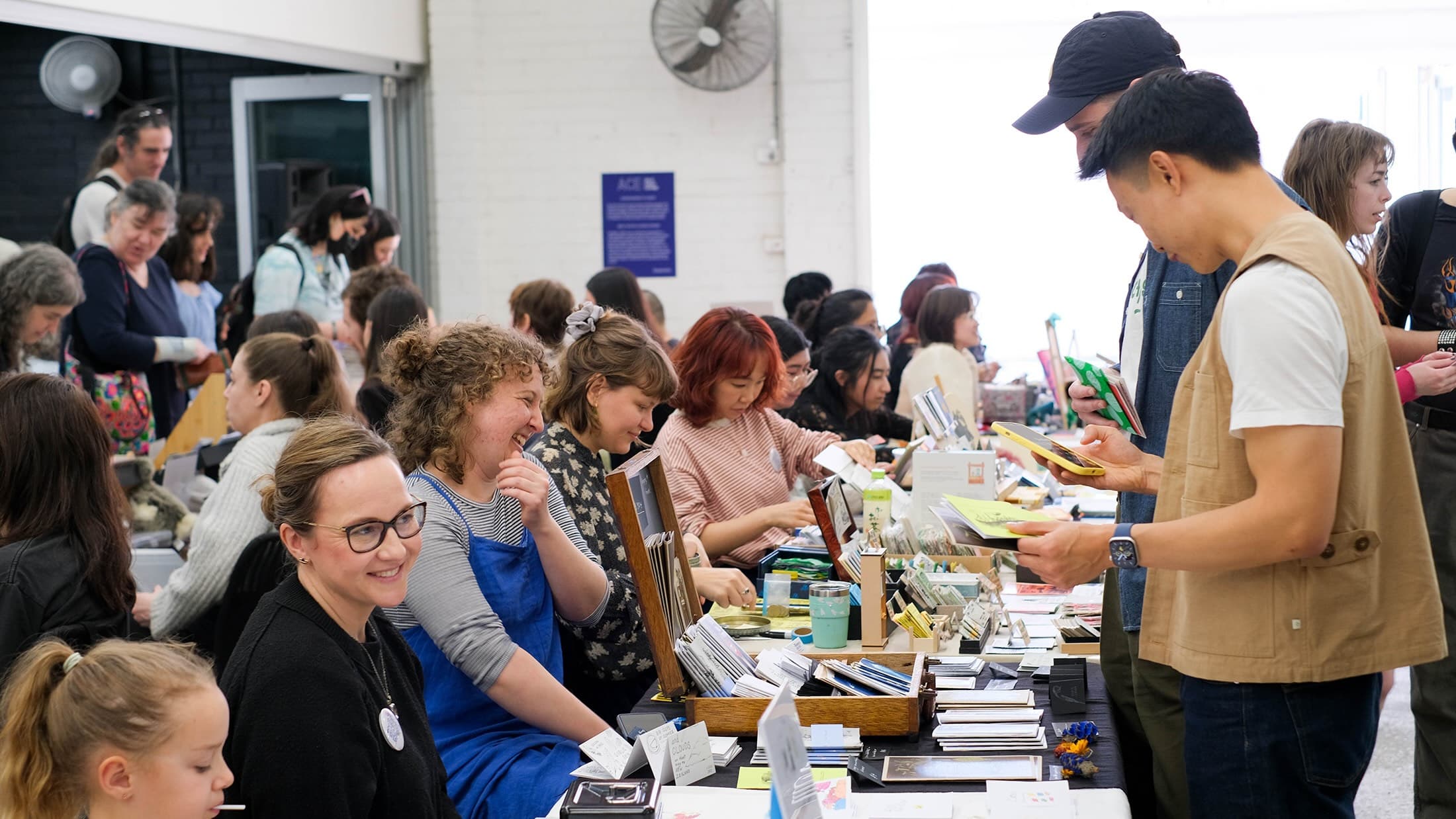 Stallholders and visitors at Parramatta Zine Fair